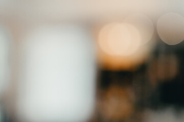Poster - Soft Blurred Background with Warm Bokeh Lights Creating a Dreamy Atmosphere for Photography or Artistic Projects