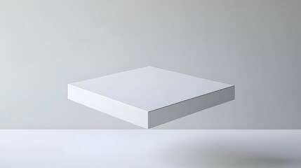 Fototapete - Floating blank square box on a minimalist surface with soft lighting, suggesting modern design concepts