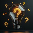 © Fatoniyah - Illuminated Question Mark Inside Glowing Lightbulb