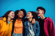 © mimagephotos - Group of Teenagers Laughing Together