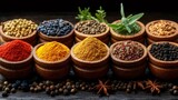 Colorful spices and herbs resting in wooden bowls on rustic table