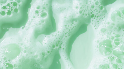 Poster - Close-up of light mint green oil substance texture for skincare or cosmetic background