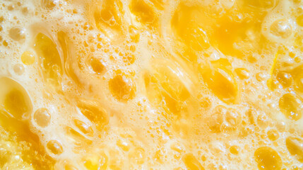 Poster - Close-up textured view of yellow bubbles and foam for artistic backgrounds and designs