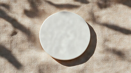 Poster - Minimalist white circular podium on textured surface for product display