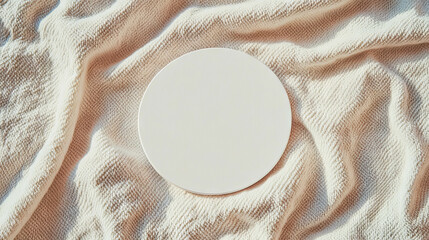Poster - Minimalist white circular podium on textured fabric surface for product display