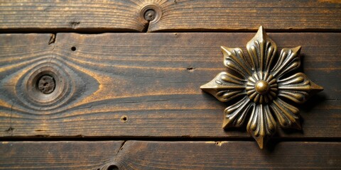 Aufkleber - Ornate bronze floral design on rustic wooden surface