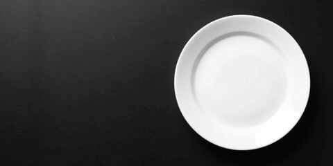 Aufkleber - A solitary, pristine white dinner plate rests on a sleek, dark surface, offering a minimalist and elegant visual composition.
