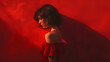 © NovaVisuals - Woman portrait with fashion style, red hair, beauty, and pose in a red background