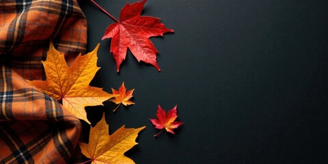 Aufkleber - Autumnal Still Life Featuring Vibrant Fall Foliage and Warm Plaid Fabric on a Dark Background