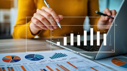 Poster - Financial Analysis: Hands of a financial professional, meticulously reviewing charts, graphs, and data displayed on both a laptop and printed documents.