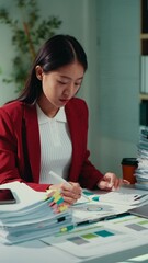 Aufkleber - Professional businesswoman reviewing financial data, concentrating on analyzing graphs within modern corporate office, displaying strategic data management skills
