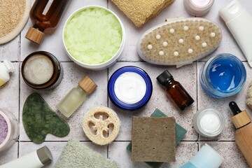 Wall Mural - different body care products on light tiled table, flat lay