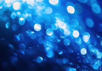 Poster - Abstract Blue Glittering Bokeh Background with Soft Light Reflections for Creative Projects and Design Applications