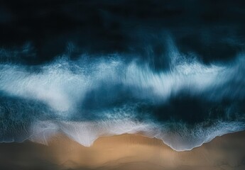 Poster - Captivating Aerial View of Waves Crashing Against Sandy Shoreline with Dark Overcast Sky and Turbulent Waters Creating Dramatic Seascape