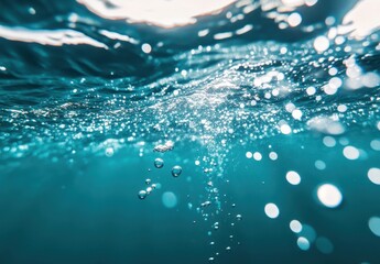 Poster - Close-Up View of Underwater Bubbles in Clear Blue Water Creating a Serene and Tranquil Atmosphere