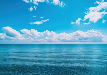 Poster - Tranquil Blue Ocean Under a Bright Sky with Fluffy White Clouds and Gentle Waves, Perfect for Serenity and Nature Themes