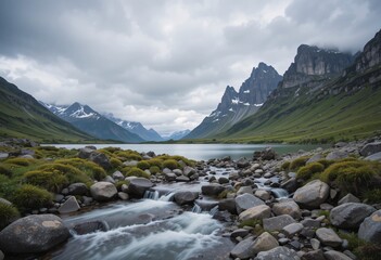 Aufkleber - Serene River Valley View. Majestic Mountain Peaks Rise Above Lush Green Hillsides. Peaceful Water Flows Over Stones Creating A Contemplative Scene. Beautiful Nature Landscape Inspires Tranquility.