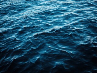 Poster - Deep Blue Ocean Waves Displaying Calm and Tranquil Water Surface with Gentle Ripples Reflecting Light in a Serene Environment