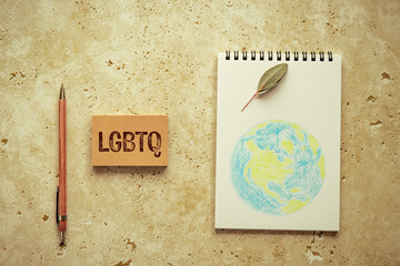 Poster - There is sticky note with the word LGBTQ. It is an abbreviation for Lesbian, Gay, Bisexual, Transgender, Questioning as eye-catching image.