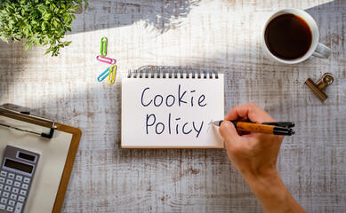 Poster - There is notebook with the word Cookie Policy. It is as an eye-catching image.