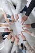 © New Africa - Unity concept. People showing V-sign with both hands and joining their fingers together in circle