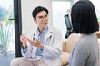 © Timeimage - Doctor discussing medication options with patient in a modern office environment