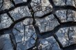 © Tang - Detailed Close-Up of a Cracked and Worn Tire Tread Surface