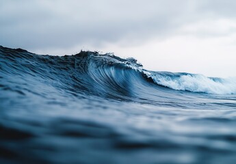 Poster - Beautiful Ocean Waves with Gentle Foam and Calm Atmosphere Under Soft Spooky Skies, Ideal for Nature and Seascape Photography