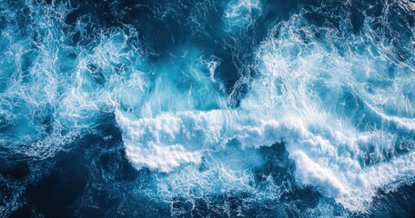Poster - Beautiful Ocean Waves with Clear Blue Water and White Foamy Crests Captured from Above, Creating a Natural Abstract Pattern in the Sea