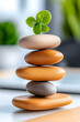 © Nadiyah - Balanced stones, sprout, office desk, zen