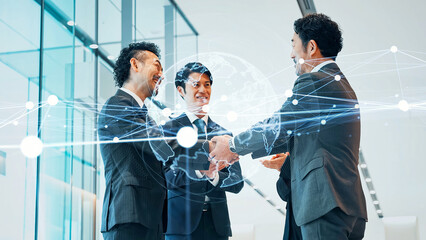 Aufkleber - Businessmen shaking hands and global network concept
