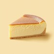 © Chamarn - Slice of cheese on yellow background with japanese cheesecake advertisement design concept