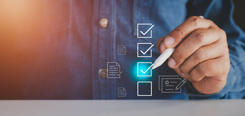 businessman mark off items on digital checklist, quality assurance and document control icons, repre