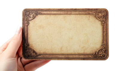 Poster - Hand holding an old blank card with an ornate border, isolated on transparent background, ideal for adding custom text or design