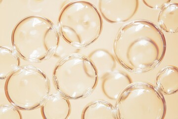 Poster - Transparent bubbles floating on a soft beige background: a macro photography close-up