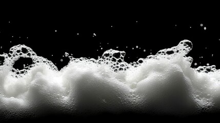 Poster - Captivating Close-Up of White Foam Waves on a Black Background Emphasizing Texture and Movement with High Contrast and Artistic Appeal