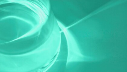 Poster - soft abstract reflection of water in a glass with turquoise light, modern minimal background for design, texture, and art

