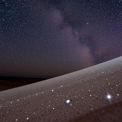 stars and a nebula in the night sky