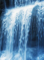 Poster - Stunning close-up of cascading water flowing over rocky surface creating a serene and calming natural scene ideal for relaxation and tranquility imagery
