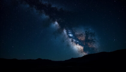 Stunning view of the Milky Way galaxy shining brightly in the night sky over mountains, cosmic beauty, serene atmosphere