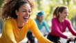 © Anna - Joyful women cycling outdoors in vibrant activewear on a sunny day