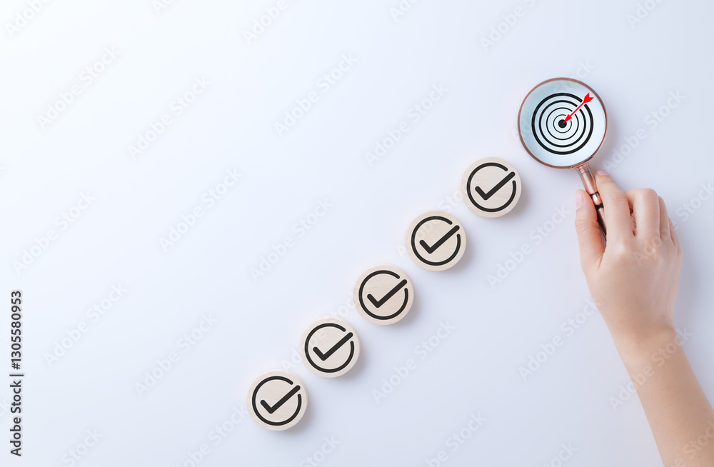 Business strategy planning and quality management concept. Magnifying ...