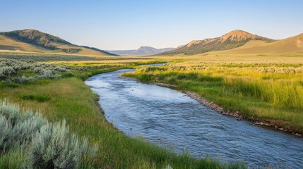 Poster - A Winding River Flows Through Open Fields And Mountains