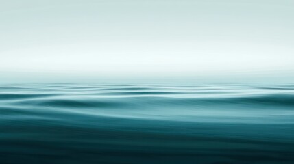Poster - Serene water surface with soft waves and a slightly overcast sky