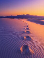 Aufkleber - Footprints on soft sand amidst vibrant sunset colors in a serene desert landscape. Generative AI