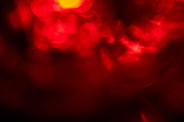 Wall Mural - red light leaks on dark background. abstract background for design with random shapes. colorful ligh
