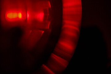 Wall Mural - red light leaks on dark background. abstract background for design with random shapes. colorful ligh