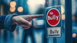 © berkah nikah - A human hand points at a sign indicating no bullying