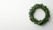 © Sariyono - Christmas wreath on white background. Concept of Christmas, holiday, and decoration.