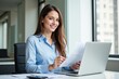 © MT - Young Adult Female Professional Working at Desk in Bright Office Environment, Reviewing Documents, Smiling at Camera, Showcasing Productivity and Modern Work Lifestyle